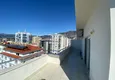 Dostępny zakup Umeblowany dwupoziomowy penthouse w Mahmutlarze z widokiem na otwarte morze 25 