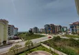 Dostępny zakup Umeblowane apartamenty w Kestel z widokiem na morze w kompleksie mieszkalnym 12