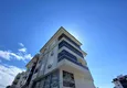 Kupić Umeblowane mieszkanie w dzielnicy Kestel z przeszklonym balkonem i widokiem na góry 3