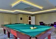 Купить Квартира в Махмутларе меблированная с застекленным балконом и открытым видом на море 19