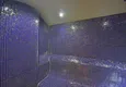 Купить Квартира в Махмутларе меблированная с застекленным балконом и открытым видом на море 24