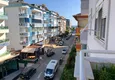 Купить Квартира в районе Оба трехкомнатная с боковым видом на море 1