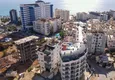 Buy 1+1 penthouse with sea and mountain views in Alanya Tosmur B21 district 1