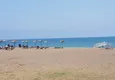 Купить Квартиры в 50 метрах от моря в современном жилом комплексе район Каргыпынары-Мерсин 13 