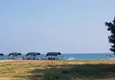 Купить Квартиры в 50 метрах от моря в современном жилом комплексе район Каргыпынары-Мерсин 15 