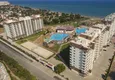 Купить Квартиры в 50 метрах от моря в современном жилом комплексе район Каргыпынары-Мерсин 20 