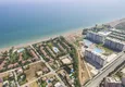 Купить Квартиры в 50 метрах от моря в современном жилом комплексе район Каргыпынары-Мерсин 21 