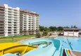 Купить Квартиры в 50 метрах от моря в современном жилом комплексе район Каргыпынары-Мерсин 25 