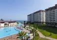 Купить Квартиры в 50 метрах от моря в современном жилом комплексе район Каргыпынары-Мерсин 1 