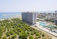 Купить Квартиры в новом жилом комплексе с видом на море и горы в районе Эрдемли-Мерсин 8 