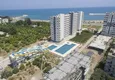 Купить Квартиры в новом жилом комплексе с видом на море и горы в районе Эрдемли-Мерсин 2 