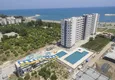 Купить Квартиры в новом жилом комплексе с видом на море и горы в районе Эрдемли-Мерсин 3 