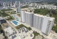 Купить Квартиры в новом жилом комплексе с видом на море и горы в районе Эрдемли-Мерсин 4 