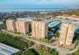 Купить Видовая трехкомнатная квартира с мебелью, застекленным балконом в районе Махмутлар 4