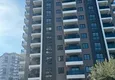 Купить Квартира 1+1 с чистовой отделкой и видом на море в районе Чешмели – Мерсин 1
