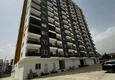 Buy One bedroom Apartment with Fine Finishing and Mountain View in Tomyuk District, Mersin. Installment is possible 18 