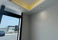 Buy One bedroom Apartment with Fine Finishing and Mountain View in Tomyuk District, Mersin. Installment is possible 24 