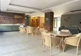 Kupić Podstawowa nieruchomość! 1+1 mieszkanie od właściciela w nowym budynku w centrum Alanyi 10 