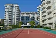 Buy 3+1 linear apartment with furniture, sea and mountain views on the beachfront - Tosmur, Alanya 14 
