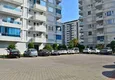 Buy 3+1 linear apartment with furniture, sea and mountain views on the beachfront - Tosmur, Alanya 15 
