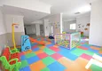 Buy 3+1 linear apartment with furniture, sea and mountain views on the beachfront - Tosmur, Alanya 22 