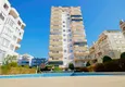 Buy Apartment in Mahmutlar modern interior, direct sea view, first coastal 2