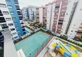 Dostępny zakup Jednopokojowe mieszkanie od właściciela w nowym budynku - dzielnica Mahmutlar, Alanya 13