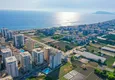 Buy Two-bedroom apartment with furniture and separate kitchen apartment in Mahmutlar 2 