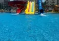 Купить Двухкомнатная квартира с чистовой отделкой в Мерсине, район Эрдемли – Арпачбахшиш 3 