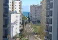 Dostępny zakup Nowy apartament z jedną sypialnią z widokiem na morze w Tomyuk, Mersin 6