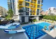 Buy 1+1 apartment in Mahmutlar with furniture and mountain views 2