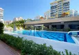 Buy 1+1 apartment in Mahmutlar with furniture and mountain views 3