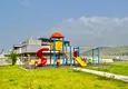 Купить Смежная двухуровневая вилла с мебелью и садом в районе Каргыджак, Аланья 4