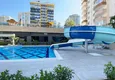 Buy 1+1 apartment in Mahmutlar with furniture and mountain views 4