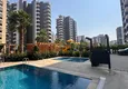 Buy Furnished one-bedroom apartment in a new residential complex, Tomyuk district, Mersin 3