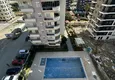 Dostępny zakup Dwupoziomowy apartament z meblami i sauną w Mahmutlar — nieruchomość dla obywatelstwa 29 