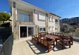 Buy 3+1 two-storey private house with pool and fully furnished in Kargicak 1 