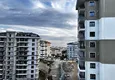 Доступная покупка Двухкомнатная квартира с частичным видом на море – Авсаллар, Алания 15