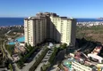 Kupić Umeblowany apartament z widokiem na góry w legendarnym kompleksie hotelowym - dzielnica Mahmutlar, Alanya 2 
