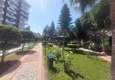 Kupić Apartament 2+1 z meblami i dwoma przeszklonymi balkonami 450 metrów od morza - Mahmutlar 11