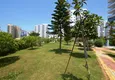 Kupić Apartament 2+1 z meblami i dwoma przeszklonymi balkonami 450 metrów od morza - Mahmutlar 13