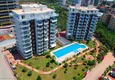 Kupić Apartament 2+1 z meblami i dwoma przeszklonymi balkonami 450 metrów od morza - Mahmutlar 1