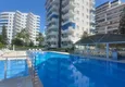 Kupić Apartament 2+1 z meblami i dwoma przeszklonymi balkonami 450 metrów od morza - Mahmutlar 3