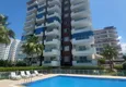 Kupić Apartament 2+1 z meblami i dwoma przeszklonymi balkonami 450 metrów od morza - Mahmutlar 4