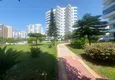 Kupić Apartament 2+1 z meblami i dwoma przeszklonymi balkonami 450 metrów od morza - Mahmutlar 9