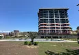Buy 1+1 apartment with sea view and fine finishing in a new complex - Alanya, Demirtas district 1