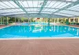 Buy Furnished 2+1 apartment in a prestigious complex - Alanya center, first coastline 12