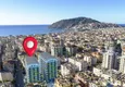 Kupić Apartament 2+1 z oddzielną kuchnią i przeszklonym balkonem w centrum Alanyi — meble odpowiednie na zezwolenie na pobyt 1