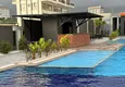 Buy 2+1 apartment with furniture, glazed balcony and sea view in the center of Mahmutlar, Alanya 3 
