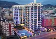 Buy Apartment 2+1 on the beachfront in Mahmutlar — a ready-made version with a sea view 1 